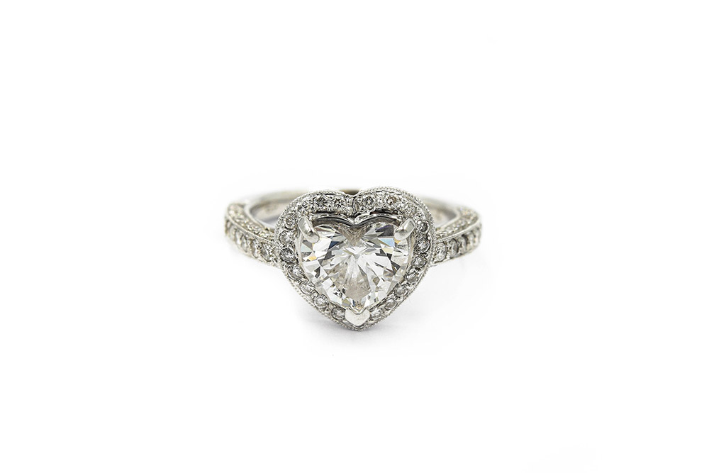 CONTEMPORARY WHITE GOLD AND HEART DIAMOND RING
